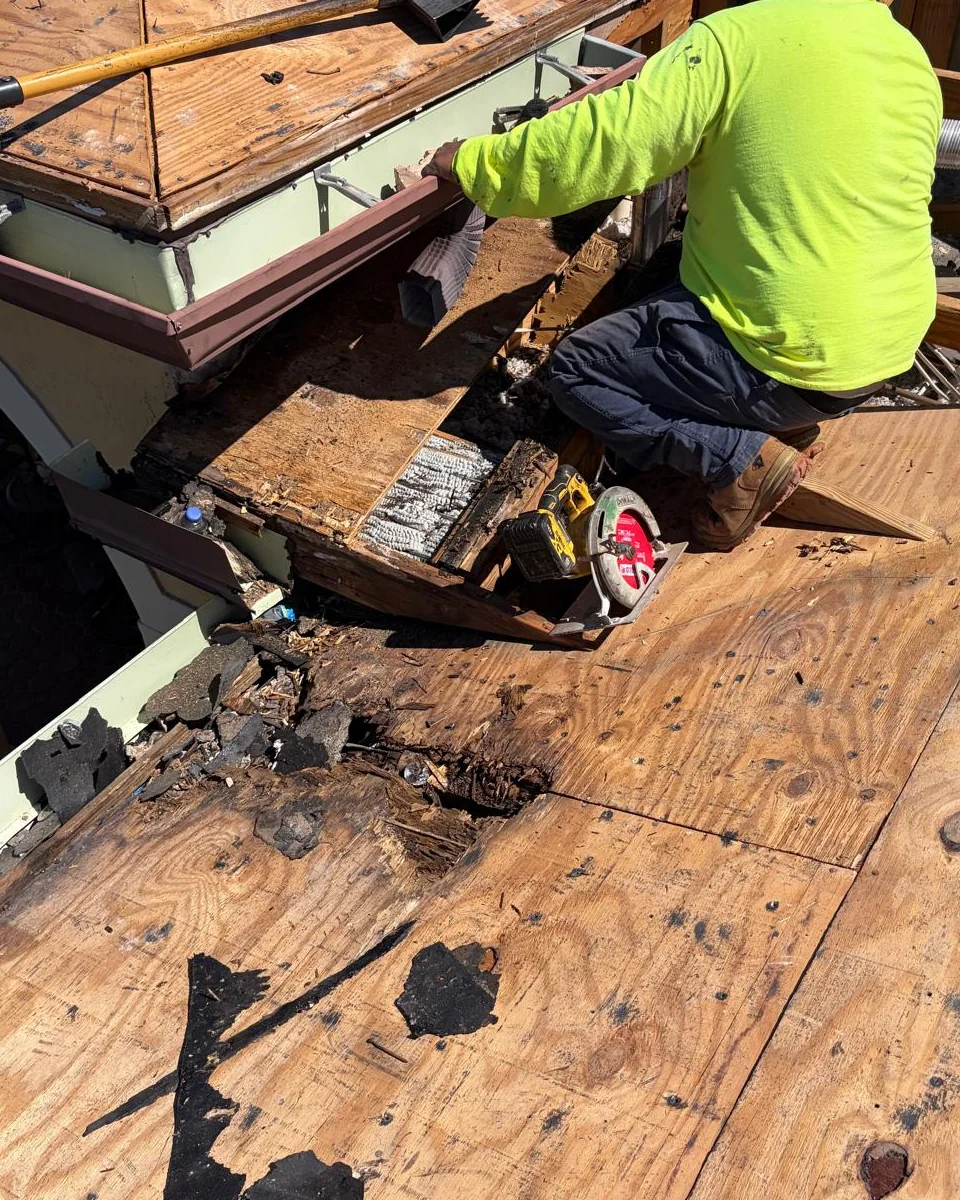 Rotted roof decking and eave wood exposed during a Miramar tile reroof