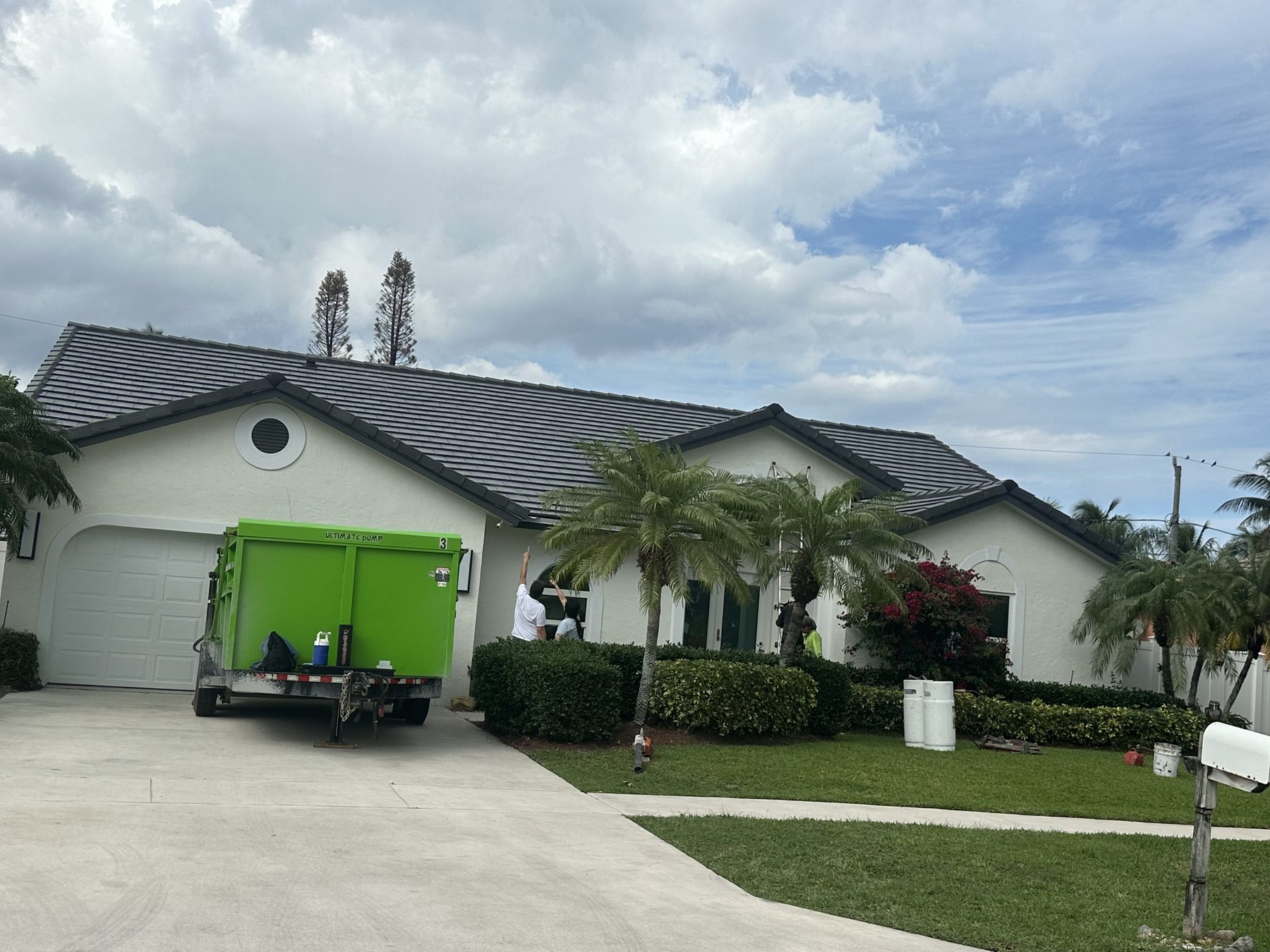 Dark gray Saxony 900 Slate concrete tile roof installed on a South Florida home.
