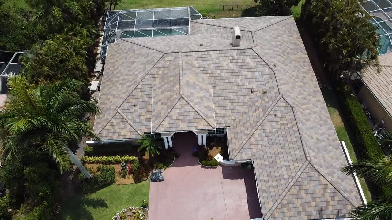 Aerial view of a South Florida home with a blended Saxony 900 Slate concrete tile roof.