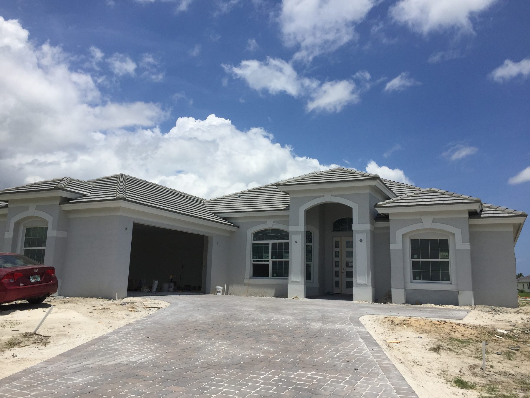 Finished light gray Saxony 900 Slate concrete tile roof on a South Florida home.